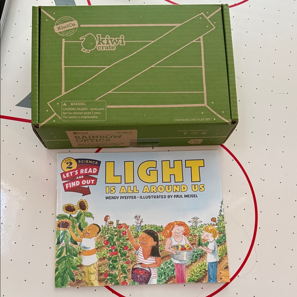 Kiwi Green KiwiCo Crate with Colorful 'Light Is All Around Us' Picture Book